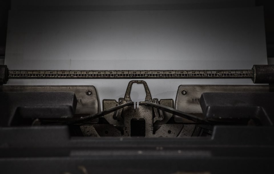 Close-up of the type bars inside a vintage typewriter